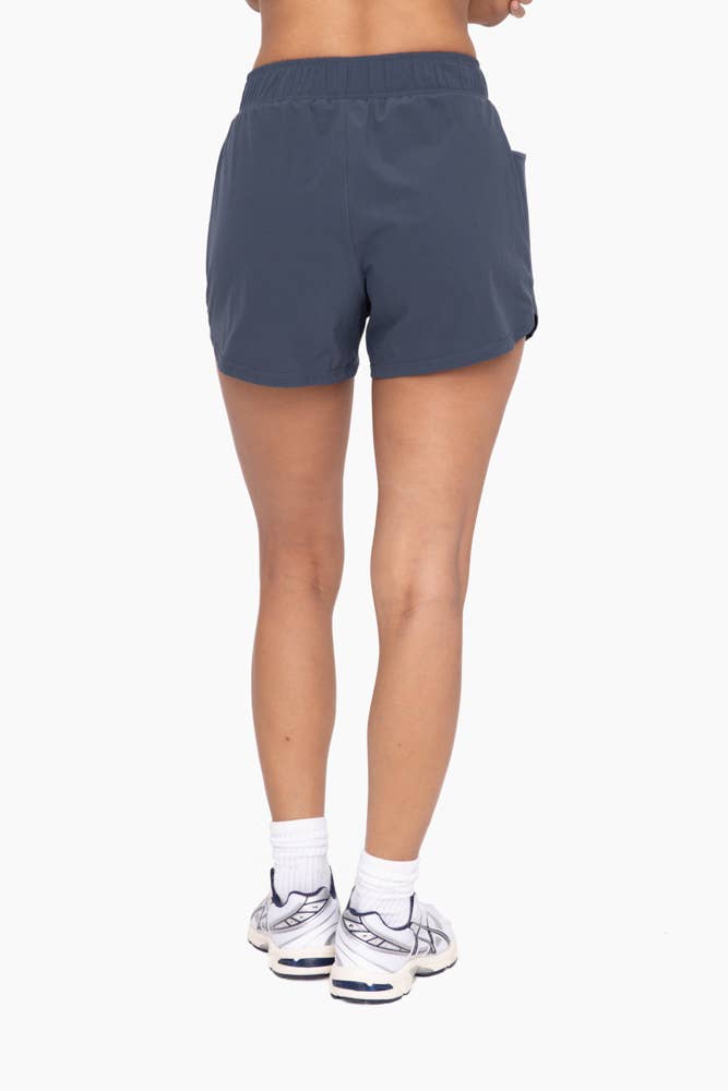 Athleisure Shorts with Curved Hemline