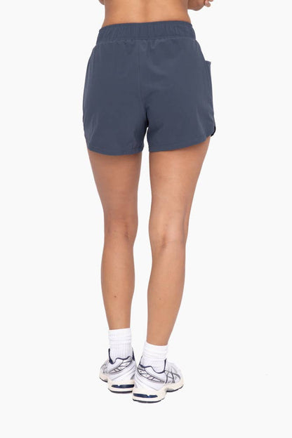 Athleisure Shorts with Curved Hemline