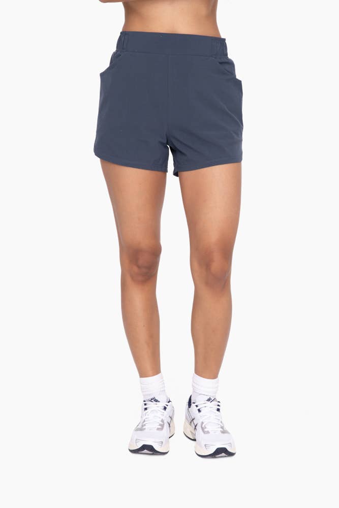 Athleisure Shorts with Curved Hemline
